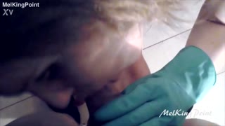 melkingpoint has this blonde milf sucking cock in plastic gloves