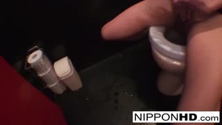 Japanese babe exposes tits pussy and ass while masturbating nude in public restroom