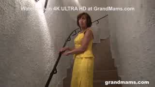 Granny Sprinkled with Cum at Sex Club