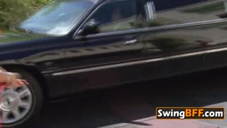 swingers group enjoys sensual fun kissing and softcore action in the sun