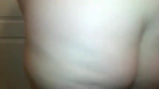 sheila bounces her huge tits in a teasing striptease show