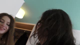 two college girls kiss passionately while sharing a thick cock for intense orgasms