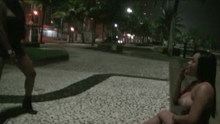 two naughty girls showing off on the streets and sucking on the beach