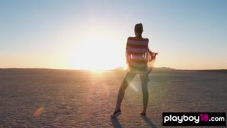 Willa Prescott bares her massive natural tits and shaved pussy posing nude in the scorching desert