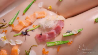 Sashimi on pussy? "Whoa, wanna taste sushi off this busty babe's oiled body?"