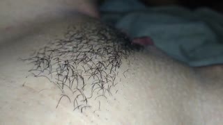 Man rims swollen pink pussy up close