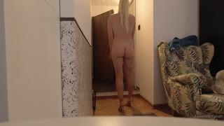 Naked blonde meets delivery guy and keeps him around
