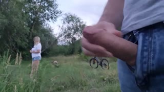 Watch a bold guy flash and stroke his huge cock in public near a stunned beauty