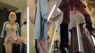 In a bustling dressing room, a hidden camera captures an upskirt view of a blonde amateur's juicy pussy as she tries on clothes