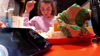 Brunette Babe Teases with Lovense Toy in Public Car Play