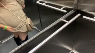 I meet my horny neighbor in the elevator and we fuck until we get caught