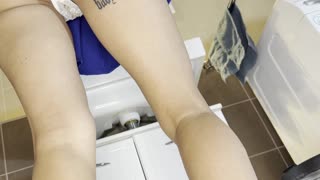 This cutie rocks a sexy blue mini skirt showing off her panties