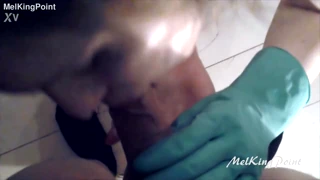 melkingpoint has this blonde milf sucking cock in plastic gloves