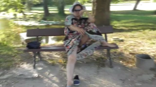 hairy mature flashes her body in the park while she's walking
