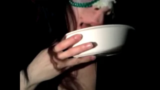 Brunette slut spits and swallows piss