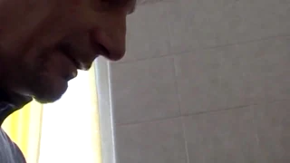 amateur heads to bathroom pees then licks her wet pussy