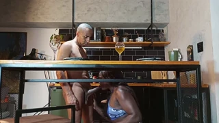 the man in the skirt encounters a surprise as the black visitor stretches things out