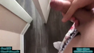 a woman assisted ejaculation and displayed her breasts to the man