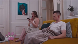 Busty Amber Bloom caught jerking guy on couch, spanked hard in doggy