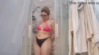 a blonde takes her shower