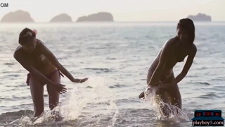 How do the girlfriends enjoy the ocean on EroZyx?