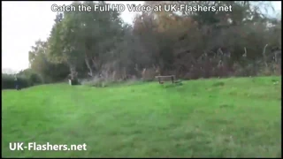 British redhead milf flashes pussy and pisses outdoors on the edge